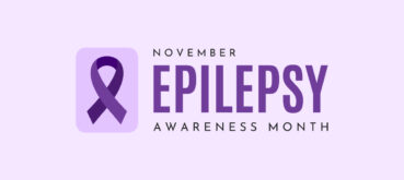 A more compact version of the sign with a purple ribbon and the words November Epilepsy Awareness Month with Epilepsy in large text in the center, over a pink background.